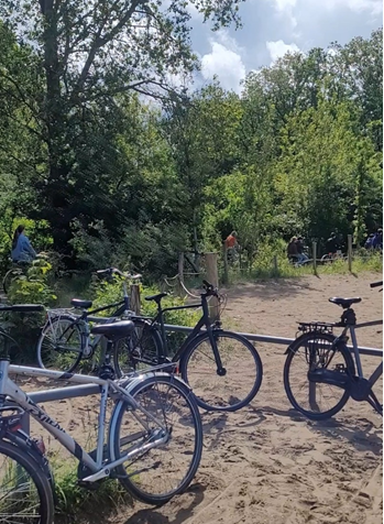 A children’s outdoor play area with ample bike parking and surrounded by cycle paths for school-children to cycle together, playfully, to and from school. (credit: Deirdre Harrington) 